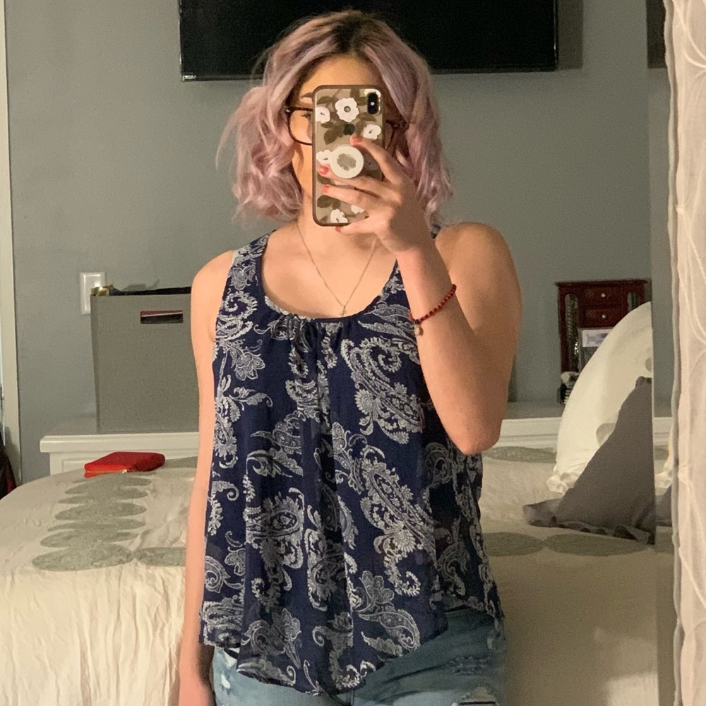 Woman’s blue tank top